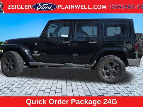 Used 2014 Jeep Wrangler Unlimited Sahara w/ Dual Top Group AWD/4WD image 2