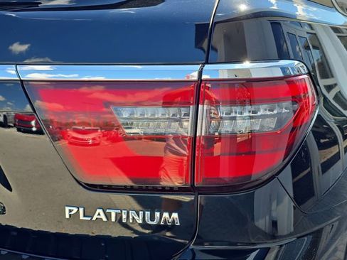 Used 2021 Nissan Armada Platinum w/ Captain's Chairs Package RWD image 6