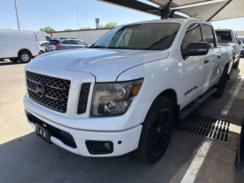 Used 2019 Nissan Titan SL w/ Midnight Edition RWD image 1