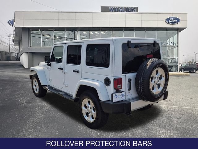 Used 2014 Jeep Wrangler Unlimited Sahara w/ Dual Top Group AWD/4WD image 6