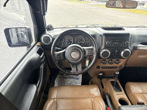 Used 2011 Jeep Wrangler Unlimited Sahara w/ Dual Top Group AWD/4WD image 14