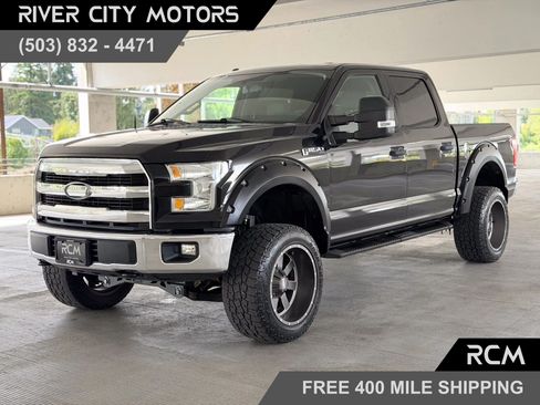 Used 2015 Ford F150 XLT AWD/4WD image 1