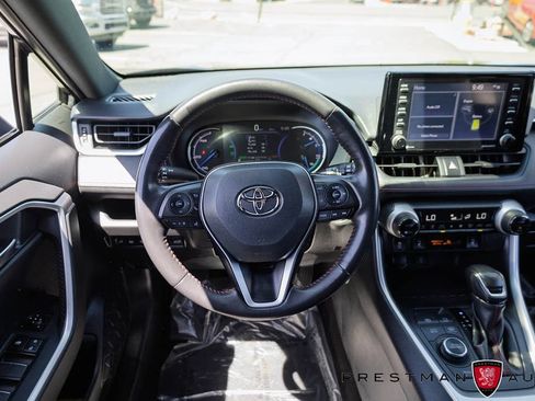 Used 2022 Toyota RAV4 SE w/ Weather & Moonroof Package AWD/4WD image 2