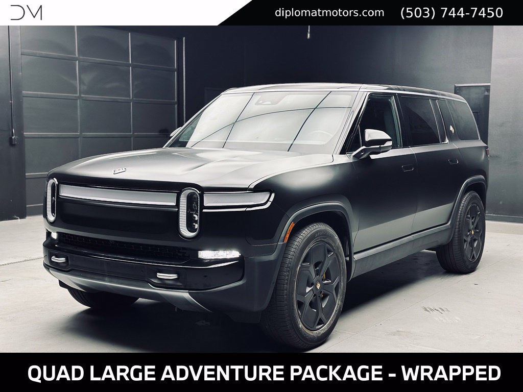 Used 2024 Rivian R1S Adventure Quad AWD/4WD image 1