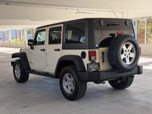 Used 2011 Jeep Wrangler Unlimited Rubicon w/ Dual Top Group AWD/4WD image 7