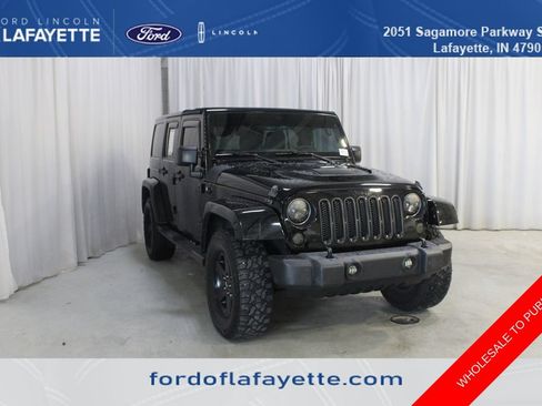 Used 2015 Jeep Wrangler Unlimited Sahara AWD/4WD image 1