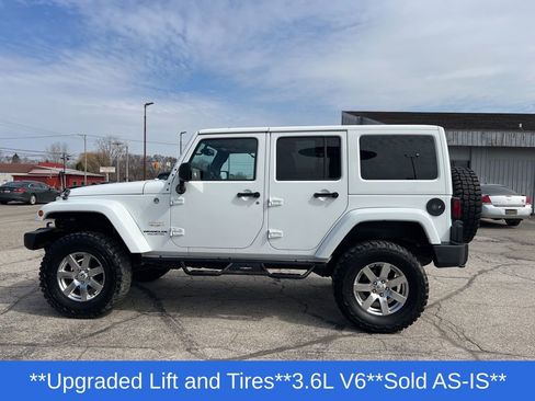 Used 2013 Jeep Wrangler Unlimited Sahara w/ Dual Top Group AWD/4WD image 2