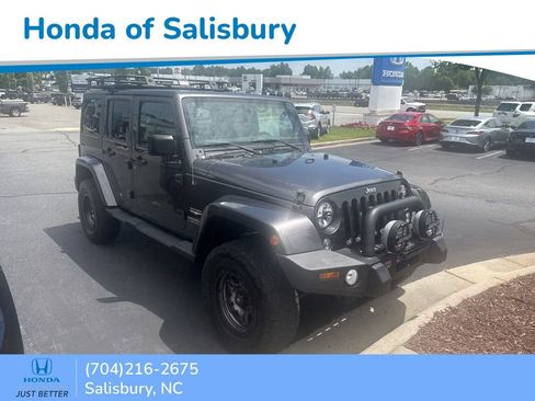 Used 2014 Jeep Wrangler Unlimited Sahara w/ Connectivity Group AWD/4WD image 1