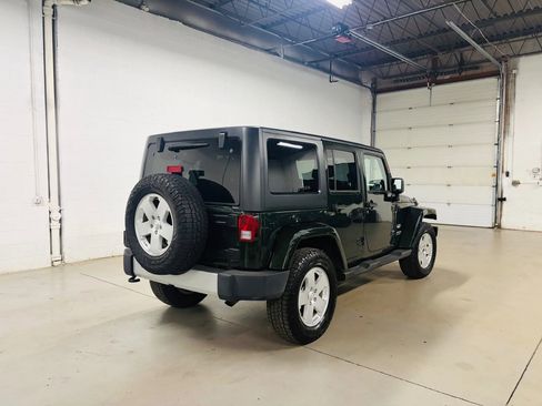 Used 2011 Jeep Wrangler Unlimited Sahara w/ Dual Top Group AWD/4WD image 8