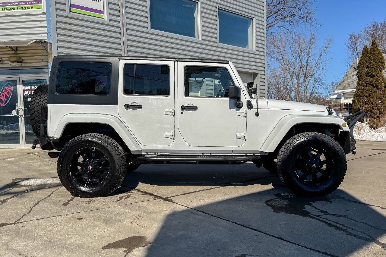 Used 2014 Jeep Wrangler Unlimited Sahara w/ Dual Top Group AWD/4WD image 3