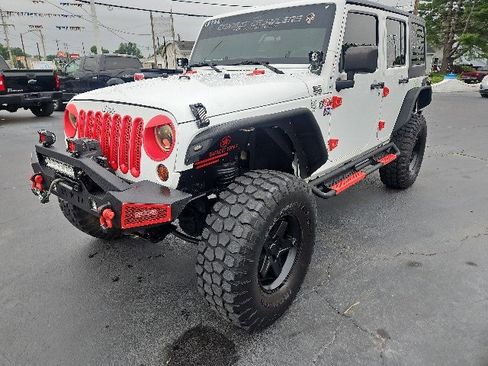 Used 2012 Jeep Wrangler Unlimited Sport AWD/4WD image 1