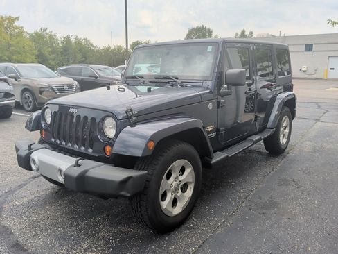 Used 2013 Jeep Wrangler Unlimited Sahara w/ Connectivity Group AWD/4WD image 1
