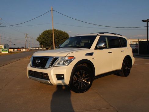 Used 2017 Nissan Armada Platinum w/ Captain Seat Package RWD image 1