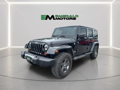 Used 2011 Jeep Wrangler Unlimited Sport w/ Dual Top Group AWD/4WD image 1