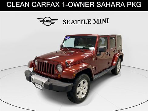 Used 2010 Jeep Wrangler Unlimited Sahara w/ Dual Top Group image 1