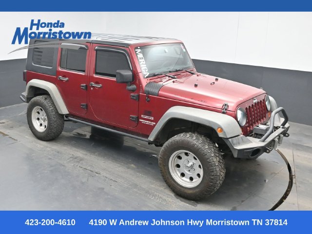 Used 2012 Jeep Wrangler Unlimited Sport w/ Max Tow Pkg AWD/4WD image 1