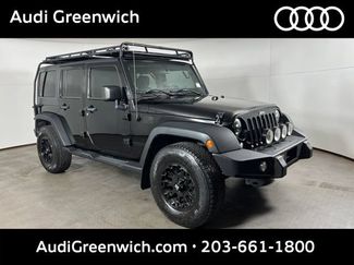 Used 2012 Jeep Wrangler Unlimited Sport AWD/4WD video 1