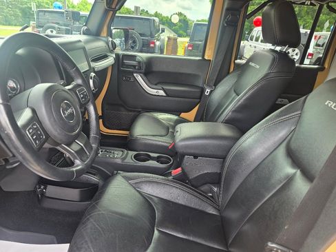 Used 2014 Jeep Wrangler Unlimited Rubicon w/ Dual Top Group AWD/4WD image 8