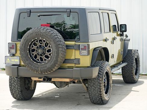 Used 2013 Jeep Wrangler Unlimited Sport w/ Mopar Black Appearance Group image 43