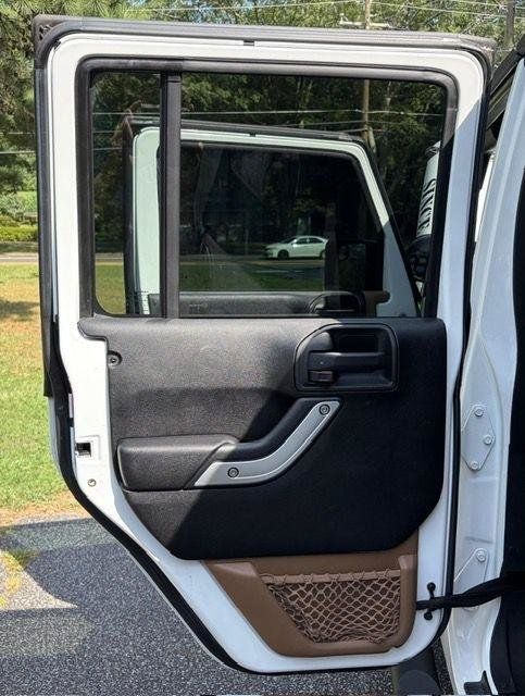 Used 2013 Jeep Wrangler Unlimited Sahara w/ Dual Top Group AWD/4WD image 17