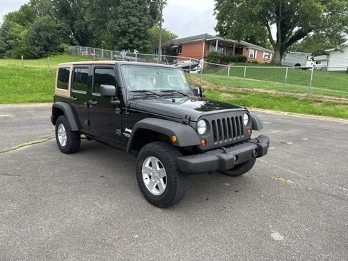 Used 2013 Jeep Wrangler Unlimited Sport AWD/4WD image 2