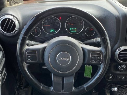 Used 2013 Jeep Wrangler Unlimited Sahara w/ Dual Top Group AWD/4WD image 19