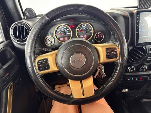 Used 2014 Jeep Wrangler Unlimited Sahara AWD/4WD image 14