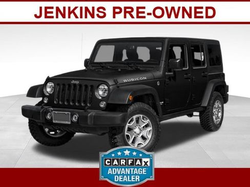 Used 2015 Jeep Wrangler Unlimited Rubicon w/ Dual Top Group AWD/4WD image 1