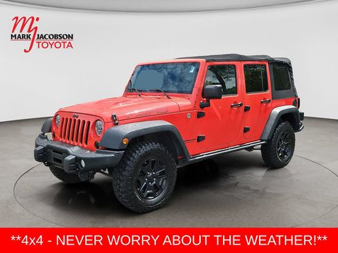 Used 2013 Jeep Wrangler Unlimited Sahara AWD/4WD image 1