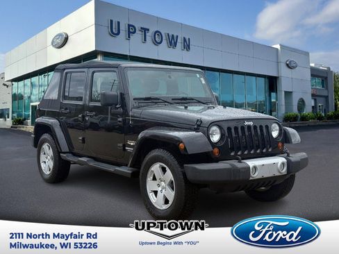 Used 2012 Jeep Wrangler Unlimited Sahara w/ Trailer Tow Group AWD/4WD image 1