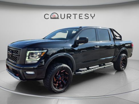 Used 2021 Nissan Titan PRO-4X w/ Off Road Protection Package AWD/4WD image 1