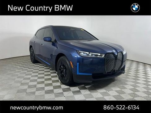 Certified 2023 BMW iX xDrive50 w/ BMW I Signature Blue Package AWD/4WD image 1