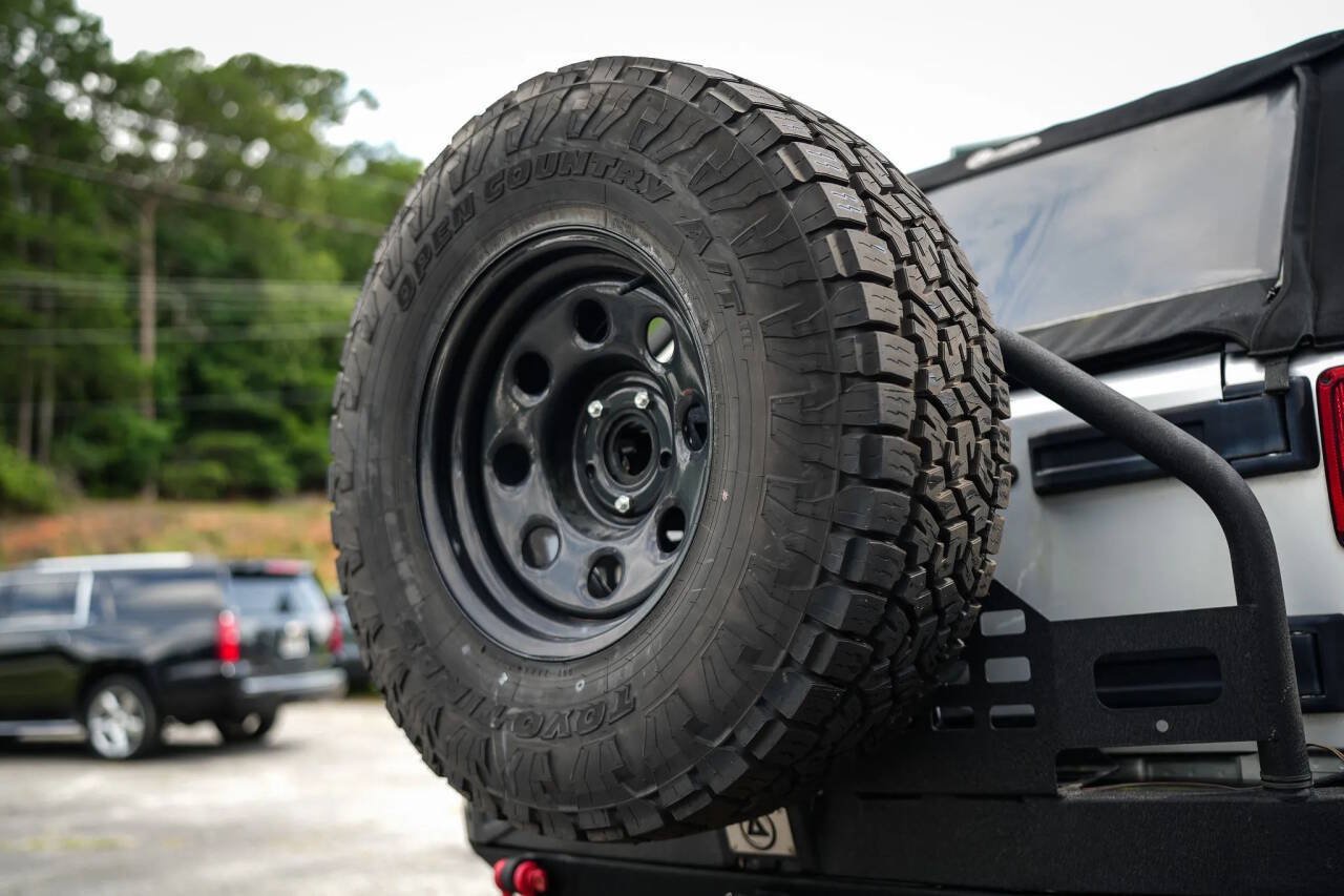 Used 2012 Jeep Wrangler Unlimited Rubicon w/ Dual Top Group AWD/4WD image 25
