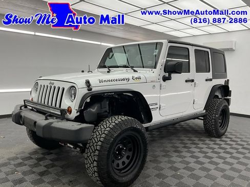 Used 2013 Jeep Wrangler Unlimited Sport image 1