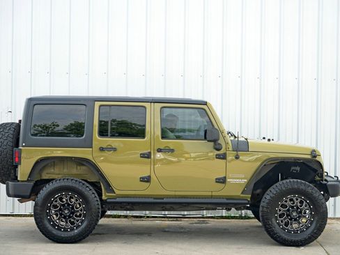 Used 2013 Jeep Wrangler Unlimited Sport w/ Mopar Black Appearance Group image 44