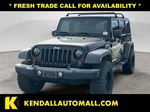 Used 2013 Jeep Wrangler Unlimited Sport AWD/4WD image 1