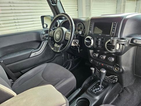 Used 2014 Jeep Wrangler Unlimited Sahara w/ Dual Top Group image 13