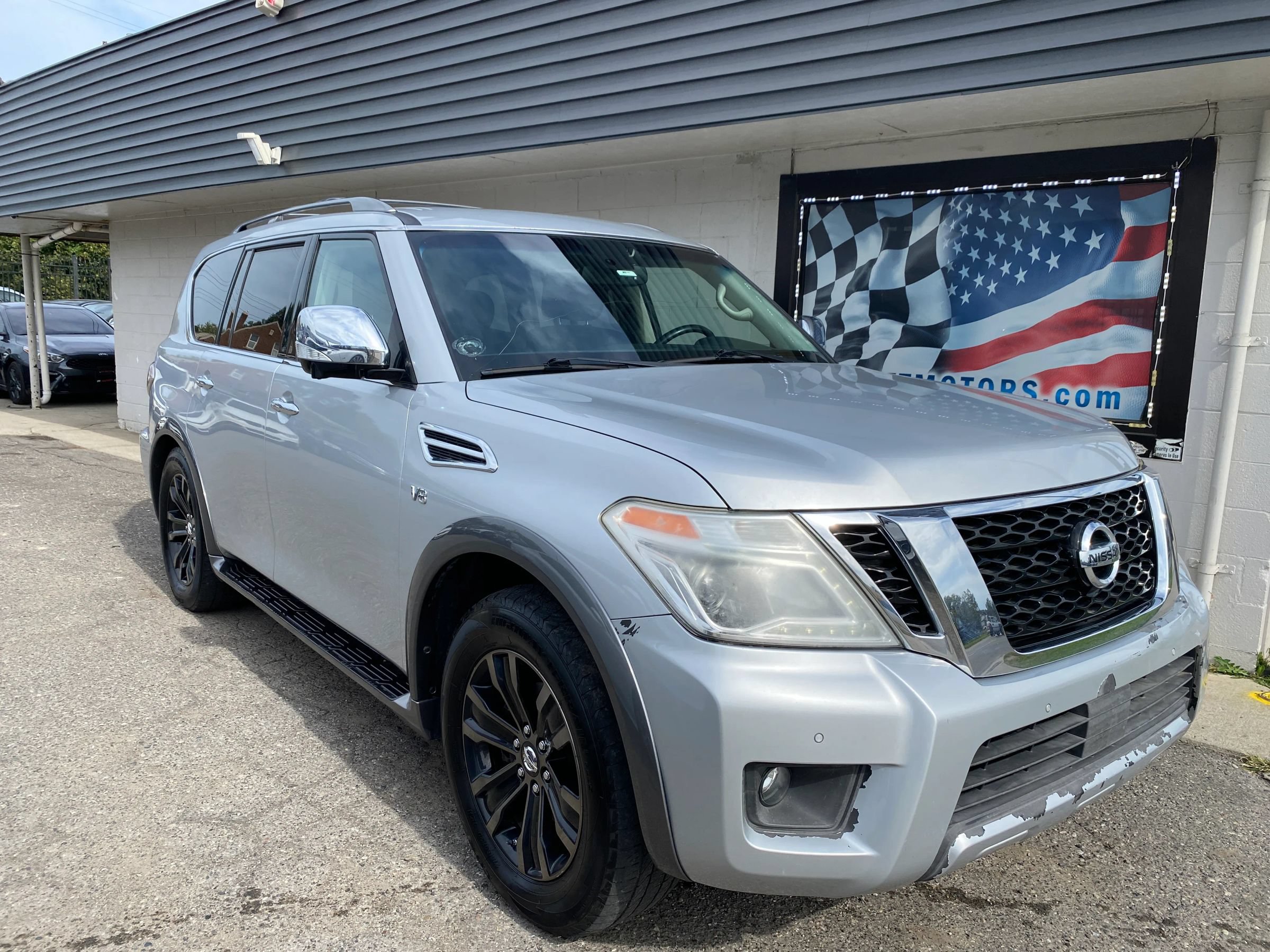 Used 2017 Nissan Armada Platinum w/ Captain Seat Package AWD/4WD image 1