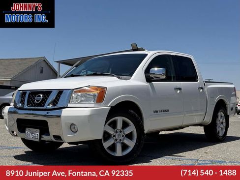 Used 2012 Nissan Titan SL RWD image 1