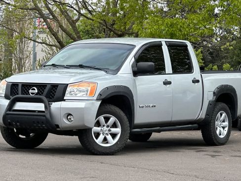 Used 2014 Nissan Titan S AWD/4WD image 1