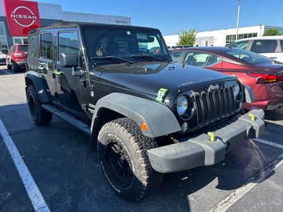 Used 2015 Jeep Wrangler Unlimited Sport w/ Mopar Black Appearance Group