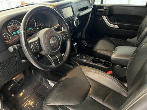 Used 2015 Jeep Wrangler Unlimited Sahara w/ Dual Top Group AWD/4WD image 11