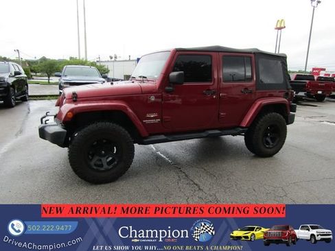 Used 2013 Jeep Wrangler Unlimited Sahara w/ Connectivity Group AWD/4WD image 1