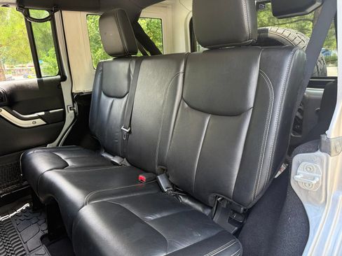 Used 2014 Jeep Wrangler Unlimited Rubicon w/ Dual Top Group AWD/4WD image 37