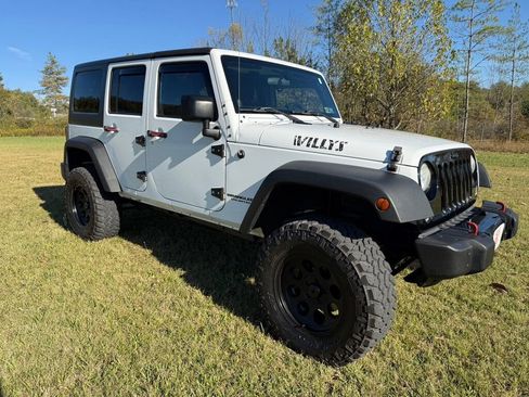 Used 2014 Jeep Wrangler Unlimited Sport image 1