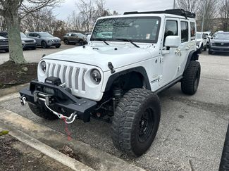 Used 2015 Jeep Wrangler Unlimited Sahara w/ Katzkin Premium Leather Group video 1