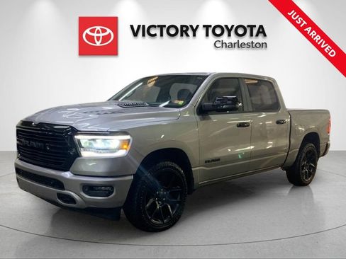 Used 2024 RAM 1500 Laramie AWD/4WD image 1