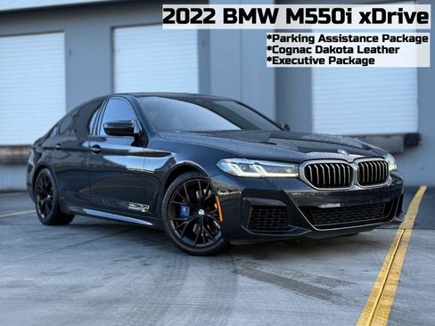 Used 2022 BMW M550i xDrive w/ Executive Package image 1