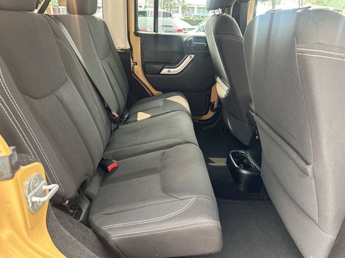 Used 2013 Jeep Wrangler Unlimited Sahara w/ Dual Top Group AWD/4WD image 14