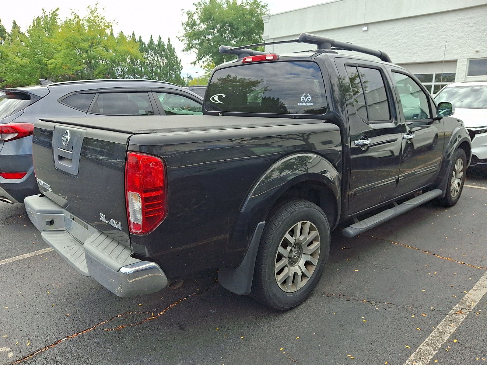 Used 2011 Nissan Frontier SL AWD/4WD image 5